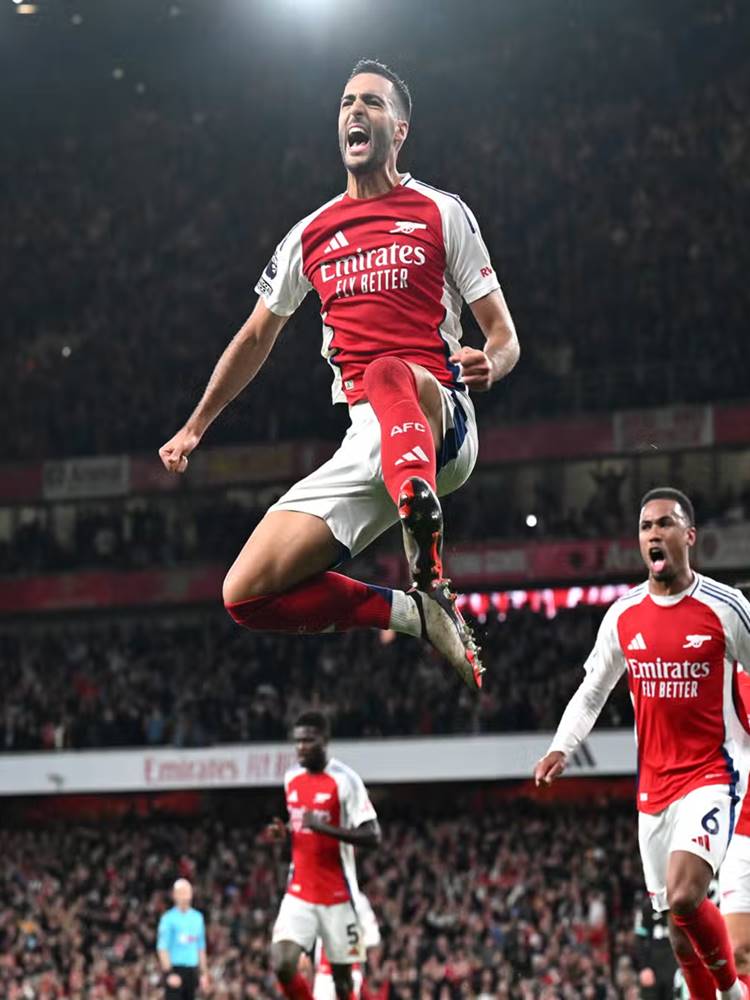 Arsenal's Merino celebrate his goal against Liverpool in 2024/25 Premier League match